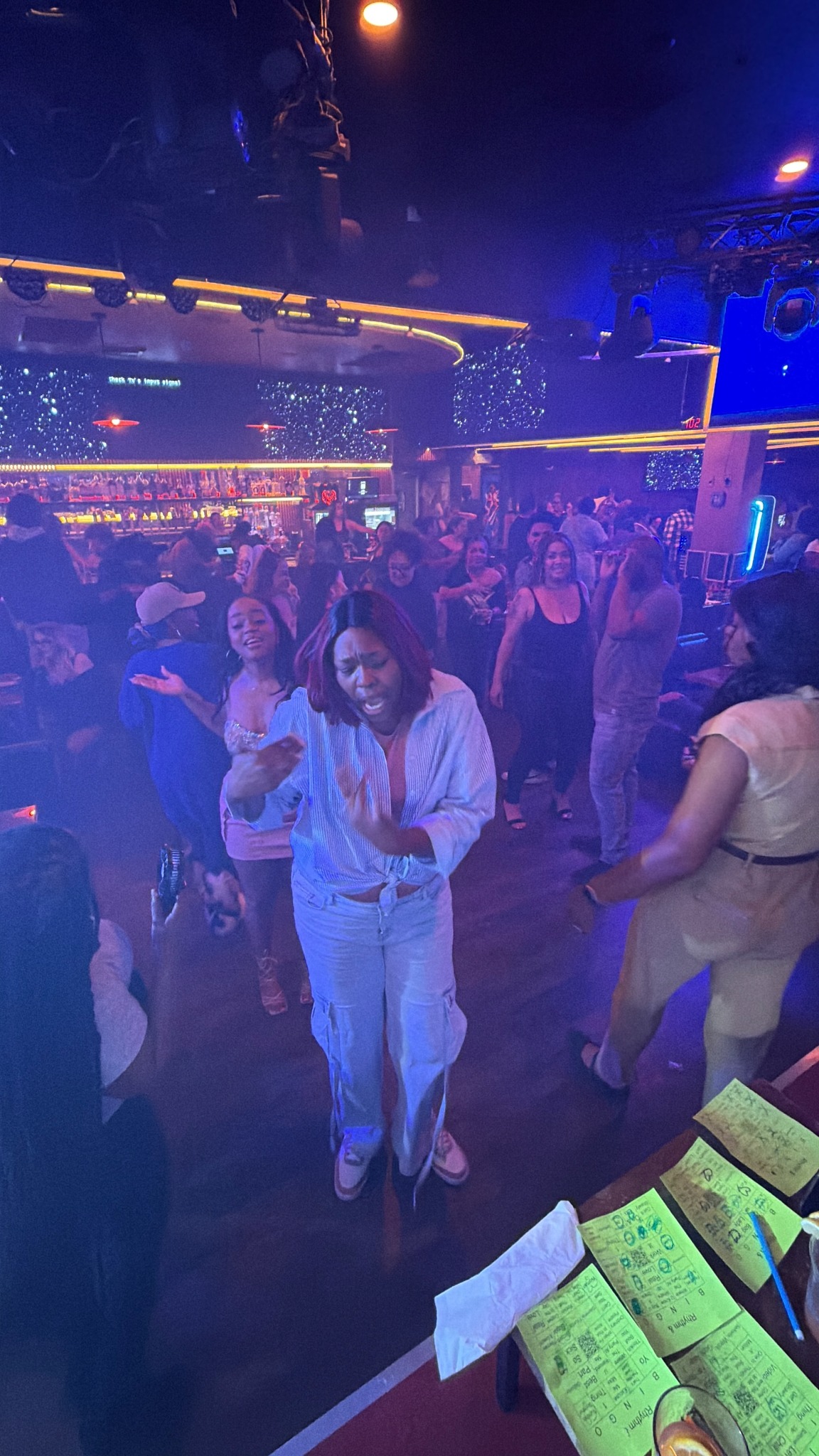 Guests singing and dancing at Rhythm and Bingo