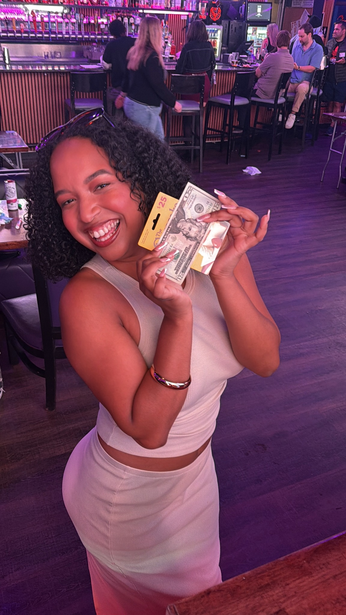 A smiling Rhythm and Bingo prize winner
